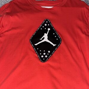 Never worn! Jordan Red T-Shirt with Black Logo